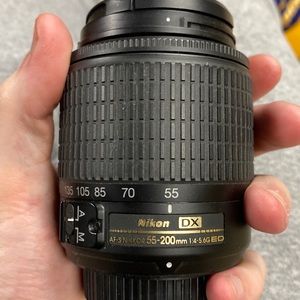 Lightly used camera attachment  Nikon DX af-s Nikki’s 55-200mm 1:4 5.6g ED